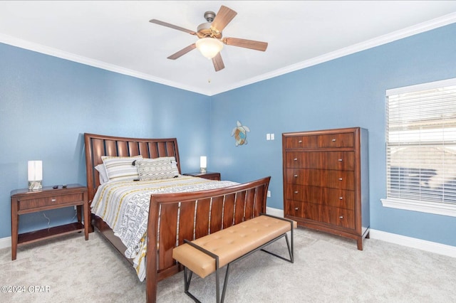 bedroom with crown molding, light colored carpet, and ceiling fan