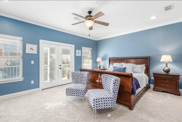 carpeted bedroom featuring ornamental molding, access to exterior, ceiling fan, and french doors