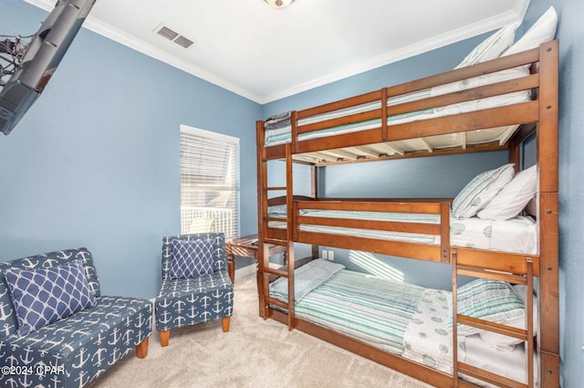 carpeted bedroom with crown molding