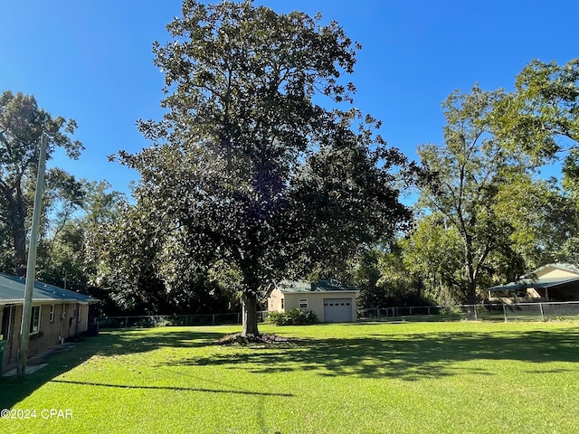 view of yard featuring a garage