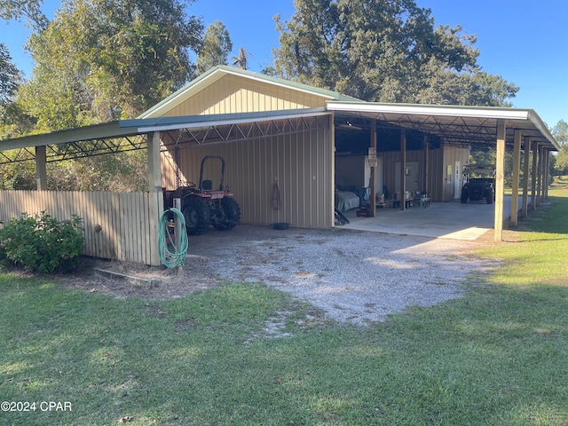 view of outbuilding with a yard