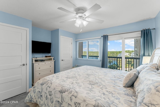 carpeted bedroom with access to exterior and ceiling fan