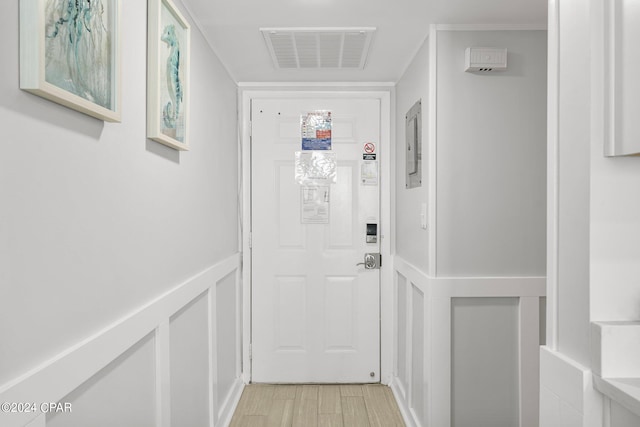 doorway to outside with light hardwood / wood-style floors