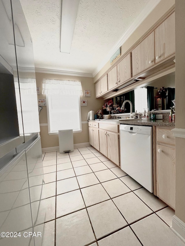 kitchen with white dishwasher, sink, crown molding, a textured ceiling, and light tile patterned flooring