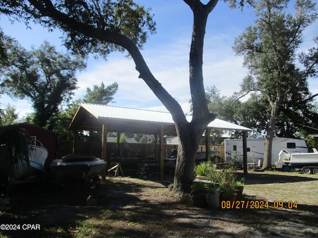 view of yard featuring a carport