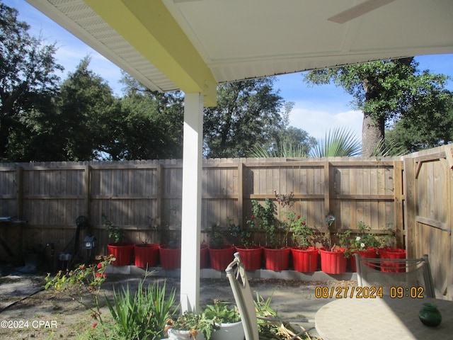 view of patio / terrace featuring ceiling fan