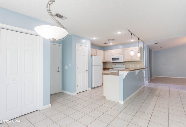 kitchen with white appliances, kitchen peninsula, a kitchen breakfast bar, pendant lighting, and light tile patterned floors