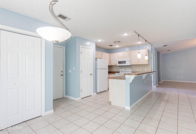 kitchen featuring a breakfast bar area, a textured ceiling, kitchen peninsula, pendant lighting, and white appliances