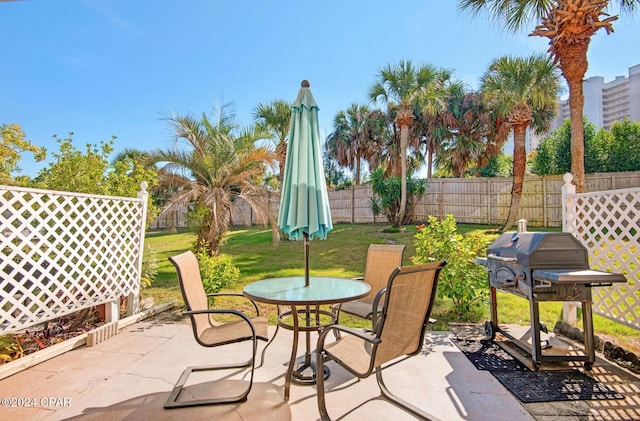 view of patio / terrace featuring a grill