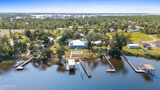 bird's eye view with a water view