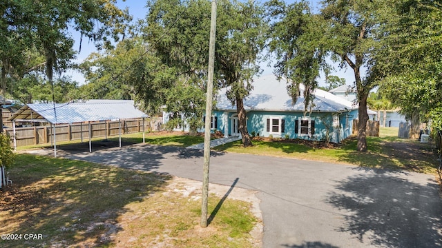 exterior space featuring a carport