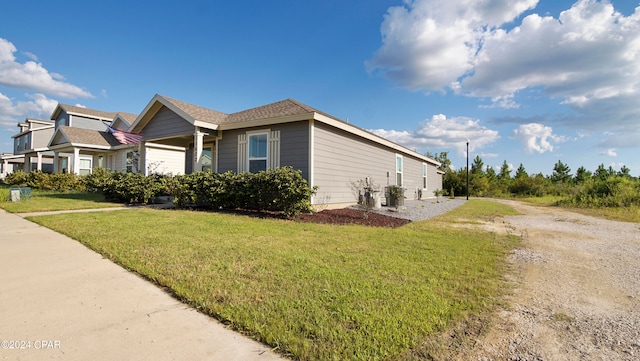 view of home's exterior featuring a yard