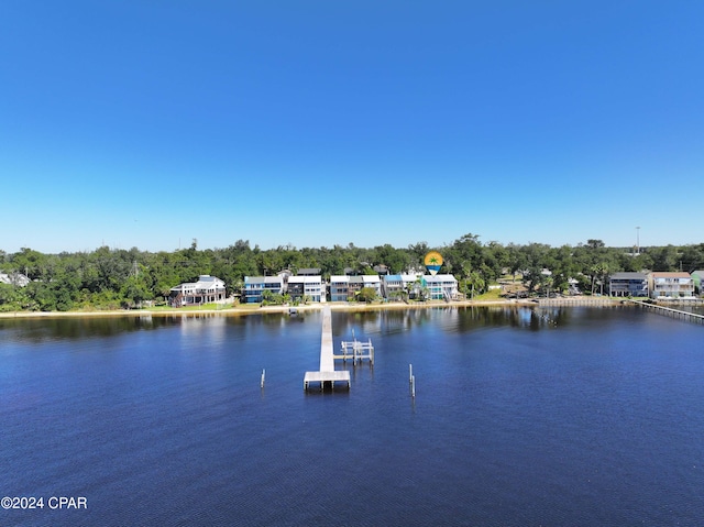 property view of water with a dock