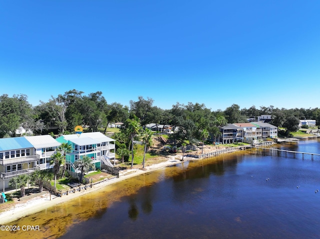 property view of water featuring stairway