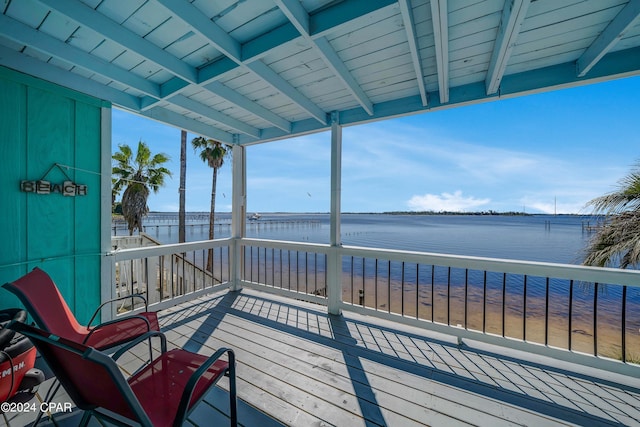 deck featuring a water view