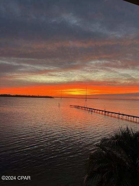 property view of water featuring a dock