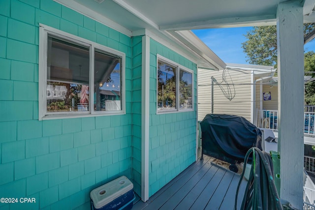 wooden deck with grilling area