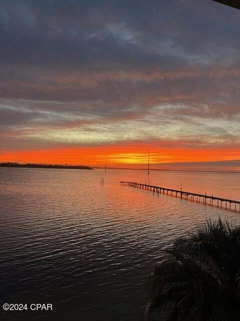 view of dock with a water view