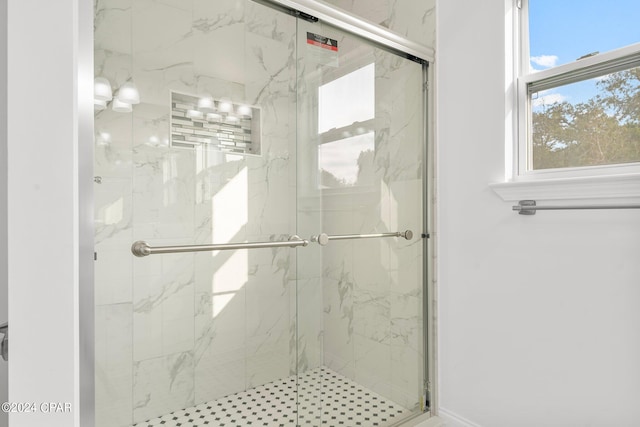 bathroom featuring walk in shower