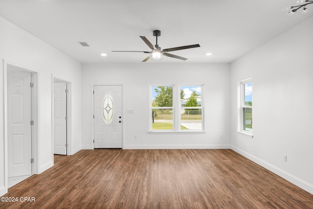 foyer entrance with ceiling fan and hardwood / wood-style floors