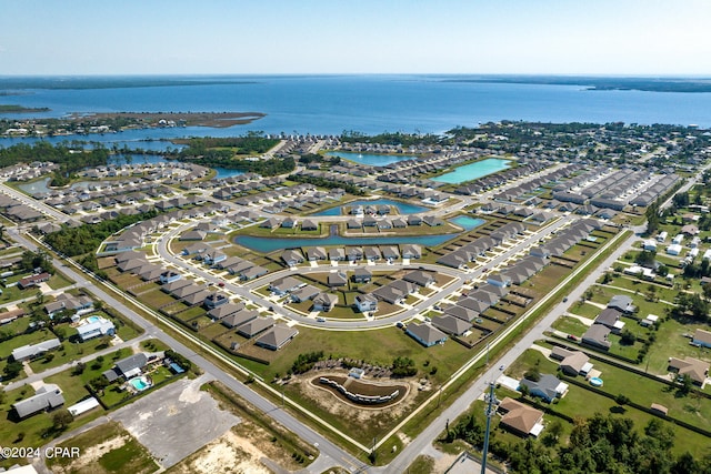 drone / aerial view with a water view