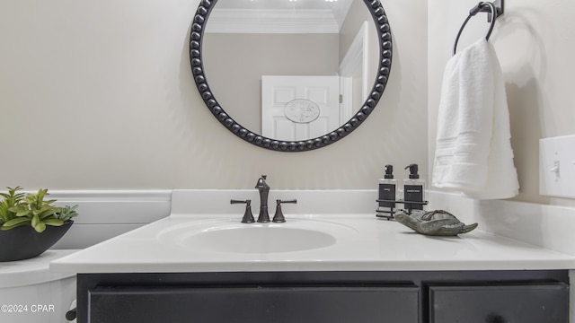 bathroom featuring vanity and crown molding