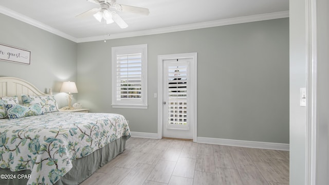 bedroom featuring ceiling fan and ornamental molding