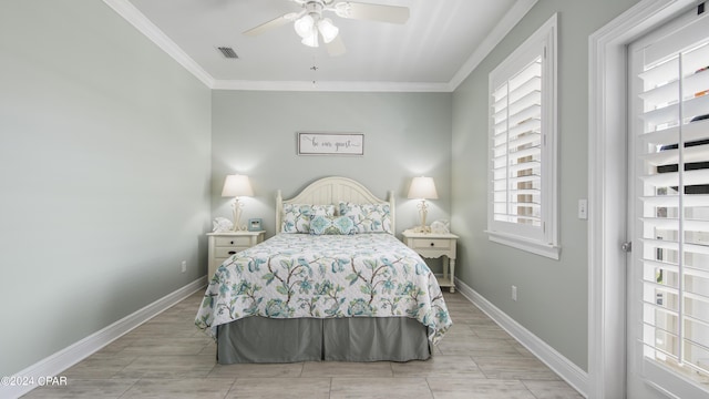 bedroom featuring ceiling fan and crown molding