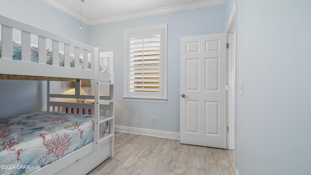 bedroom featuring crown molding