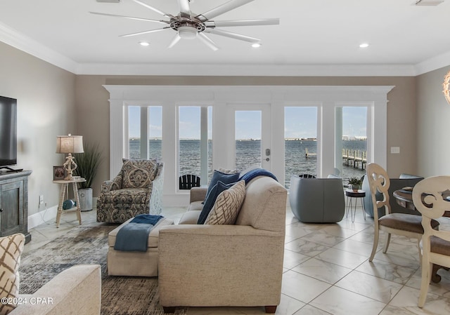 living room with ceiling fan, french doors, a water view, and ornamental molding