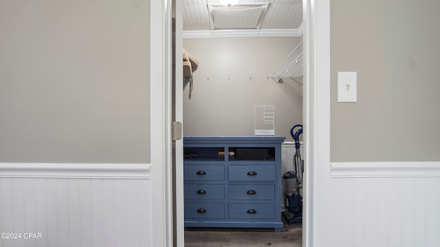 spacious closet with hardwood / wood-style flooring