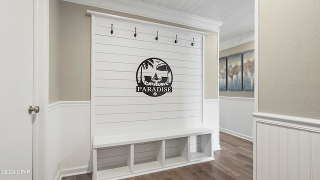 mudroom featuring ornamental molding and dark hardwood / wood-style floors