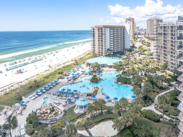 bird's eye view with a water view and a view of the beach