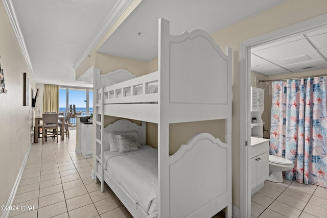 tiled bedroom with crown molding