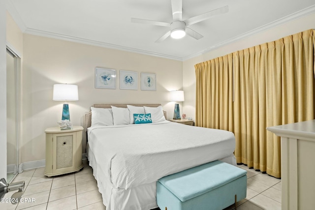 bedroom featuring ceiling fan, ornamental molding, and light tile patterned floors