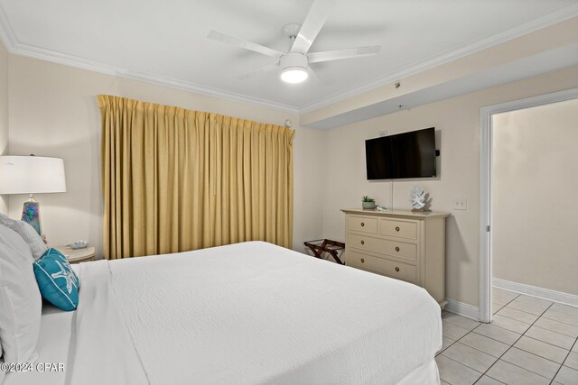 tiled bedroom featuring ceiling fan and crown molding