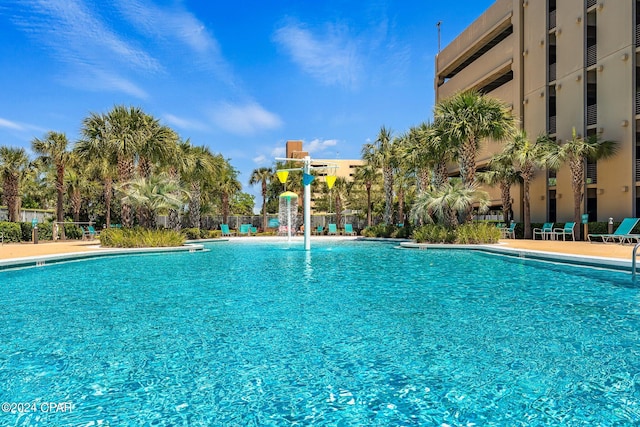 view of pool featuring pool water feature