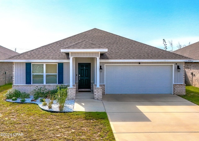 single story home featuring a front yard and a garage