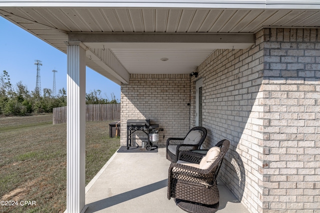 view of patio with a grill