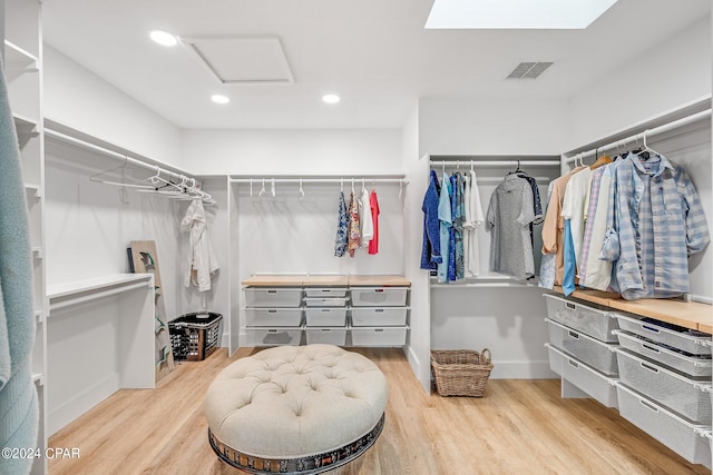 walk in closet featuring light wood-type flooring