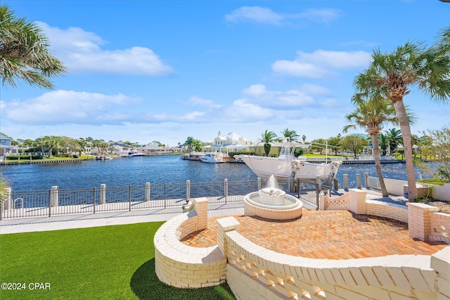 view of patio with a water view