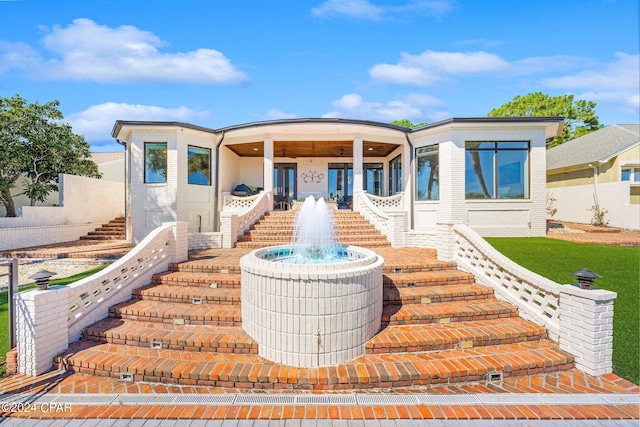 443 Wahoo Rd, Panama City Beach, FL 32408 - view of front of property featuring stairs and brick siding