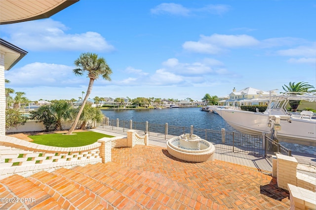 443 Wahoo Rd, Panama City Beach, FL 32408 - view of patio / terrace with a boat dock, a water view, and boat lift
