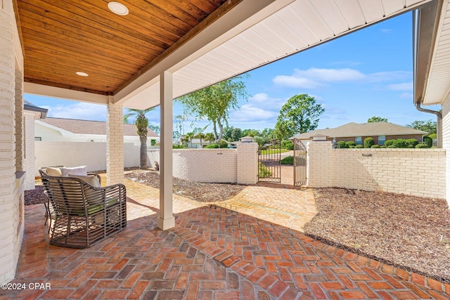 443 Wahoo Rd, Panama City Beach, FL 32408 - view of patio / terrace featuring a gate