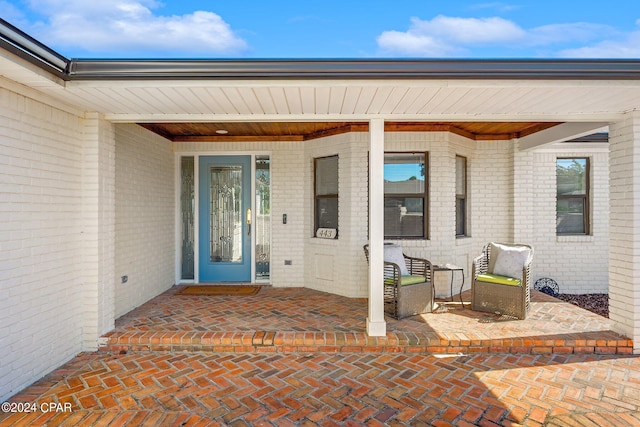 443 Wahoo Rd, Panama City Beach, FL 32408 - doorway to property with brick siding