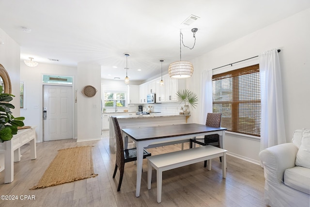 dining area featuring light hardwood / wood-style flooring