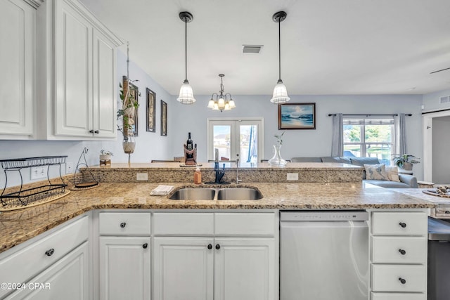 kitchen featuring french doors, sink, stainless steel dishwasher, white cabinetry, and decorative light fixtures