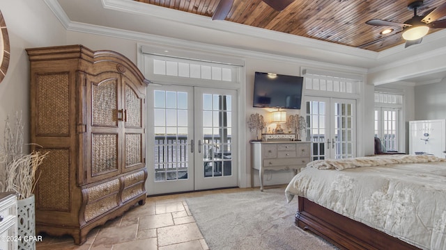 bedroom featuring a tray ceiling, stone tile floors, french doors, wooden ceiling, and access to exterior