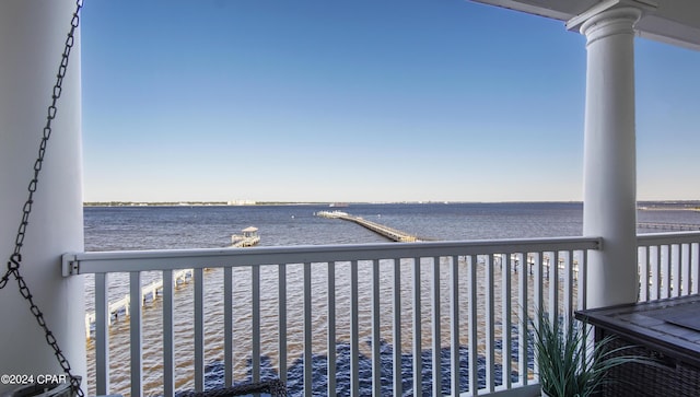 balcony featuring a water view