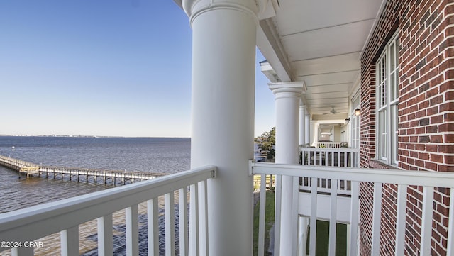 balcony featuring a water view